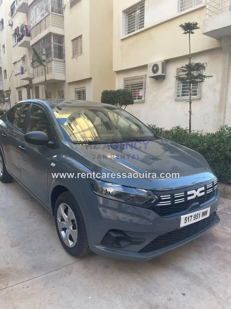 Grey Dacia Logan rental Essaouira – front three-quarter economical car | Mz Agency