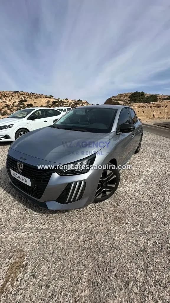 Peugeot 208 rental Essaouira – front three-quarter coastal scenery | Mz Agency