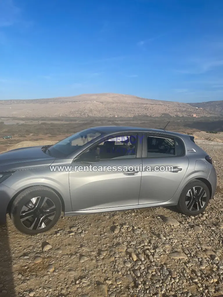 Peugeot 208 rental Essaouira – side profile Morocco road trip | Mz Agency