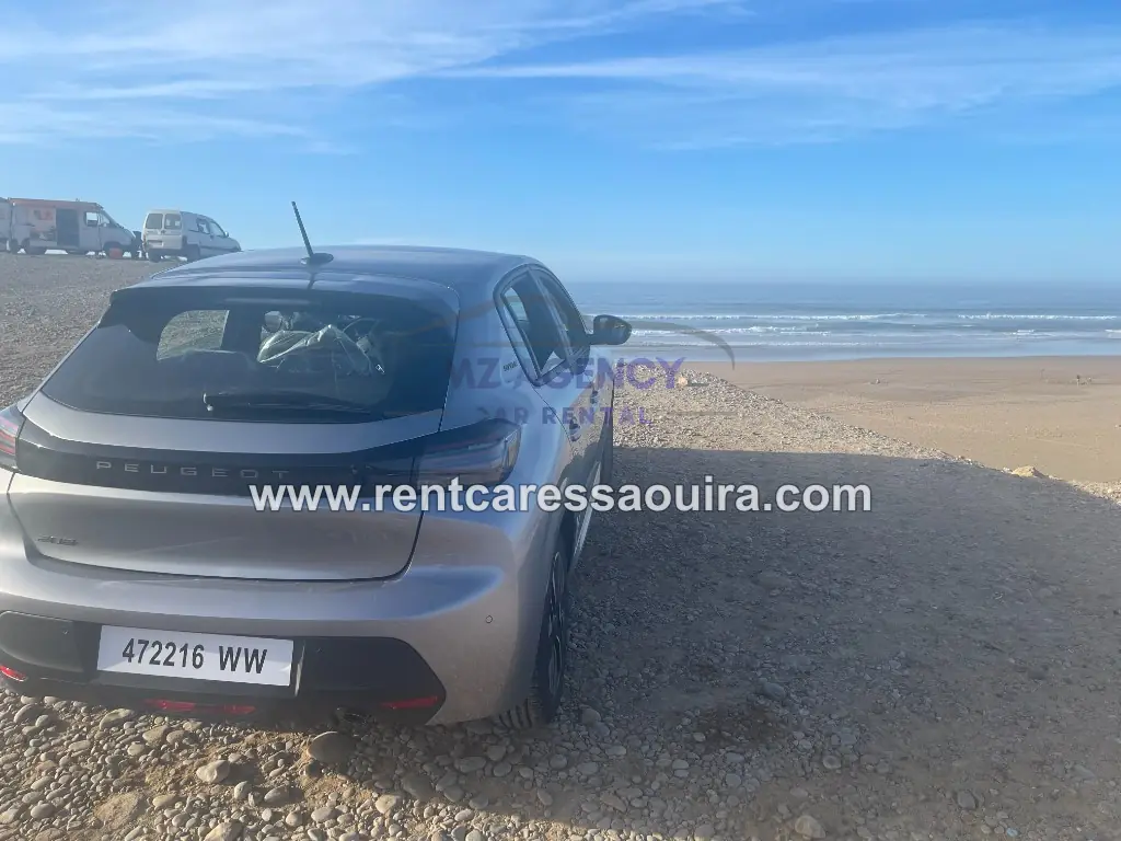 Peugeot 208 rental Essaouira – rear three-quarter cliff sea view | Mz Agency