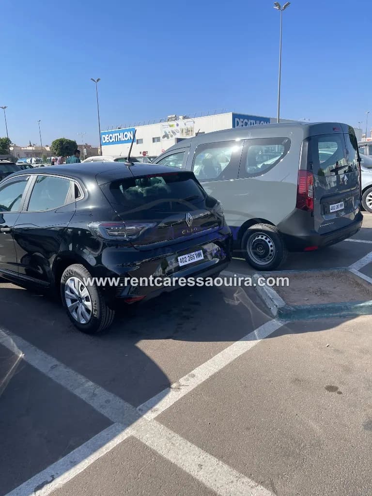 Clio 5 rental Essaouira – black hatchback coastal Morocco scenery | Mz Agency